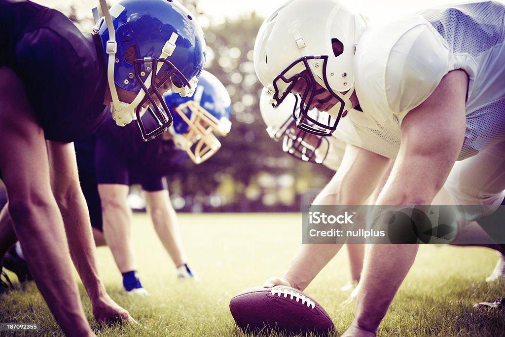 american football players facing each other Athlete Stock Photo