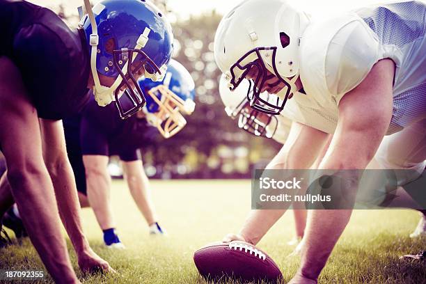 American Football Players Facing Each Other Stock Photo - Download Image Now - Athlete, University Student, American Football Team