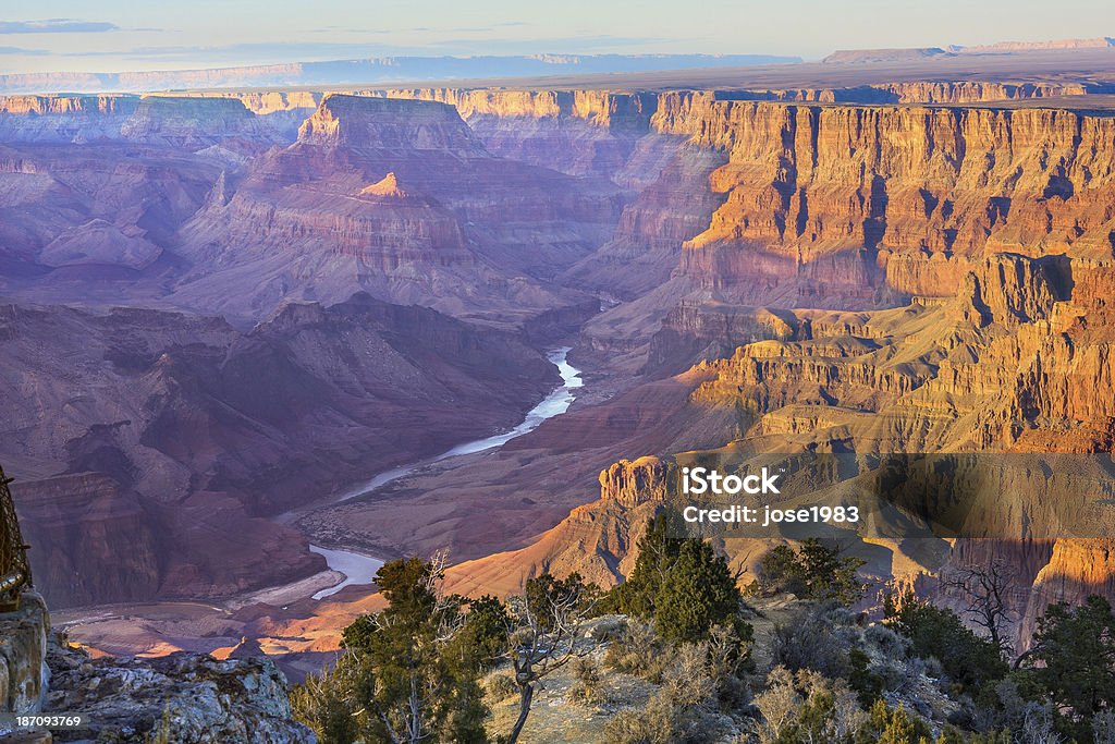 Majestic Vista of the Grand Canyon at Dusk Beautiful Landscape of Grand Canyon from Desert View Point with the Colorado River visible during dusk Arizona Stock Photo