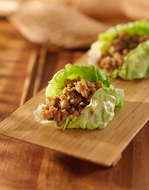 istock Asian lettuce wrap with minced chicken and seasonings 187093839