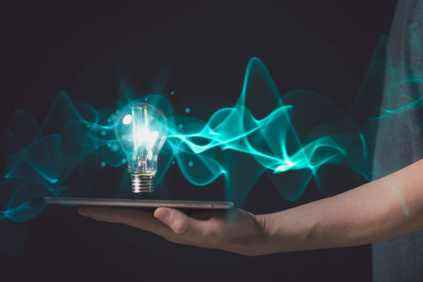 istock Businessman hand holding creative light bulb with power line technology, analysis solution and development, Modern business, Innovative of new ideas. 1870943127