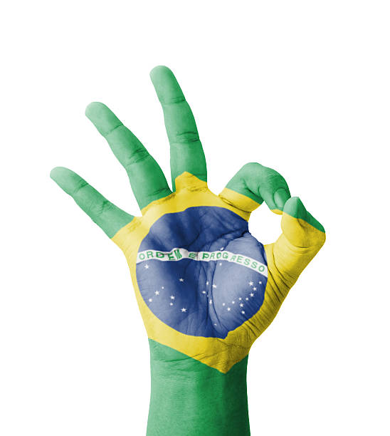 istock Hand making Ok sign, Brazil flag painted 187095444
