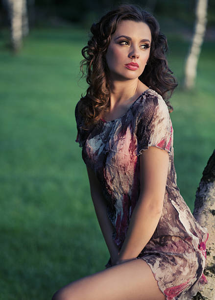 istock Delicate brunette woman looking at the landscape 187095568