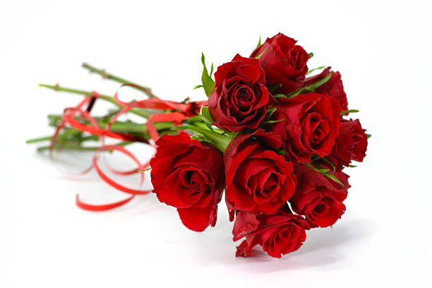 istock Large Red rose bouquet ribbon isolated on white,  side view 187097140