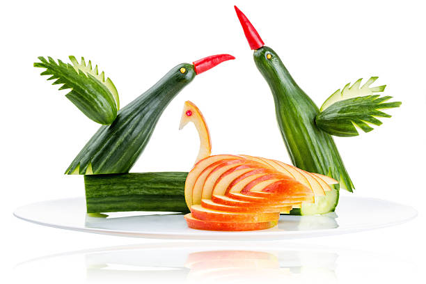 Food art Sculpture cut from fresh vegetables. carving fruit stock pictures, royalty-free photos & images