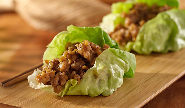 istock Asian lettuce wrap with minced chicken and seasonings 187100199