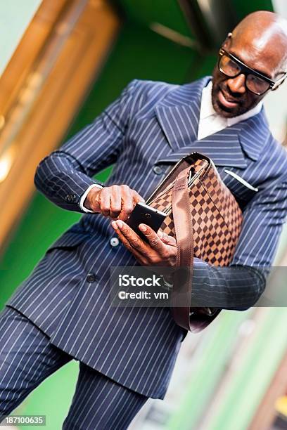 Smiling Business Man Sending Message Stock Photo - Download Image Now - 30-34 Years, Adult, Adults Only