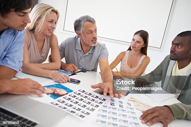 Choosing The Best Picture Possible Stock Photo - Download Image Now - Adult, African Ethnicity, African-American Ethnicity