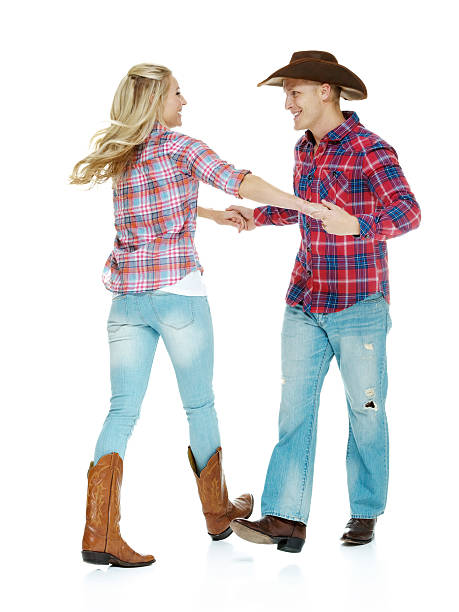 istock Young couple dancing in a white background 187100683