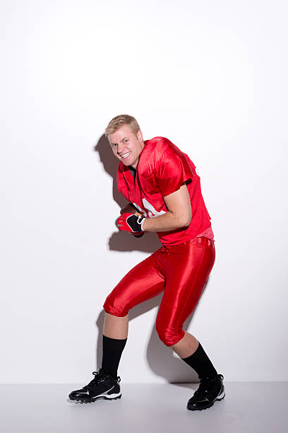 istock American football player in action 187103285