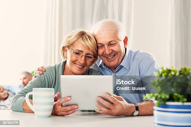 Senior Couple With Digital Tablet Stock Photo - Download Image Now - 60-69 Years, Active Seniors, Adult