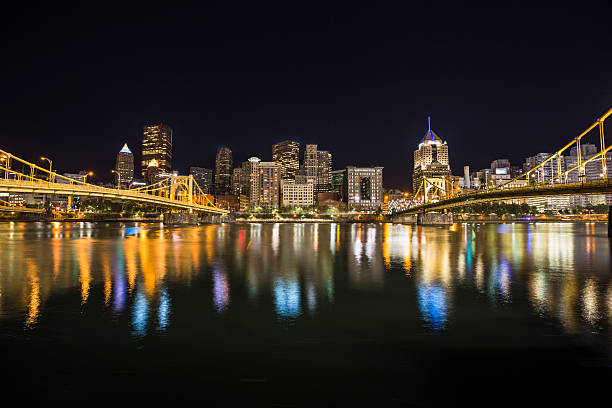 Pittsburgh night Skyline Roberto Clemente Bridge and the Andy Warhol Bridge over Allegheny River Pittsburgh Pennsylvania USA sixth street bridge stock pictures, royalty-free photos & images