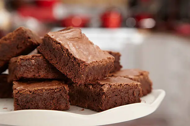 A batch of chocolate brownies on a plate