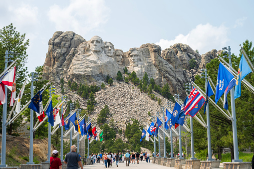 Keystone, USA - June 13, 2023. Tourists walking at Mount Rushmore National Memorial, Keystone, South Dakota, USA
