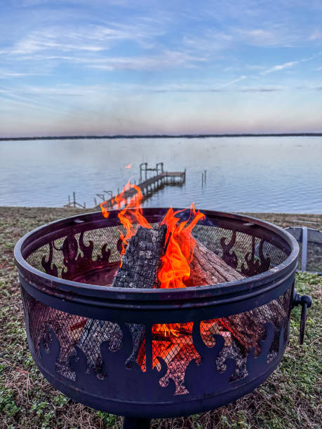 istock Fire in an outdoor fire pit by the River 1871080437