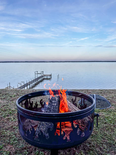 istock Fire in an outdoor fire pit by the River 1871080439