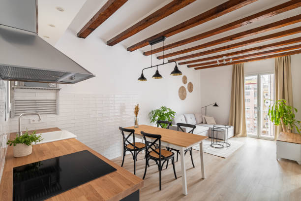 istock Stylish kitchen and dining area in modern studio apartment 1871081708