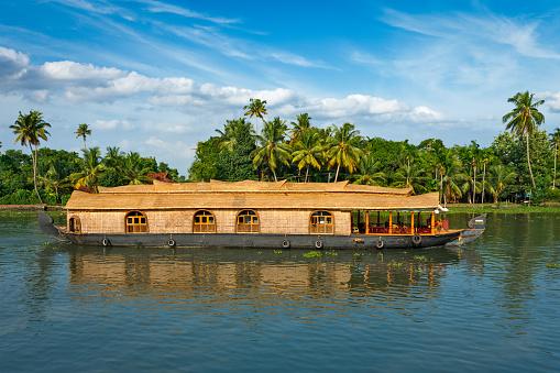 Tourism attraction of Kerala - tourist houseboat in Kerala backwaters. Kerala, India