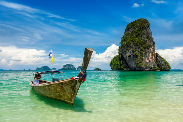 Long tail boat on beach, Thailand