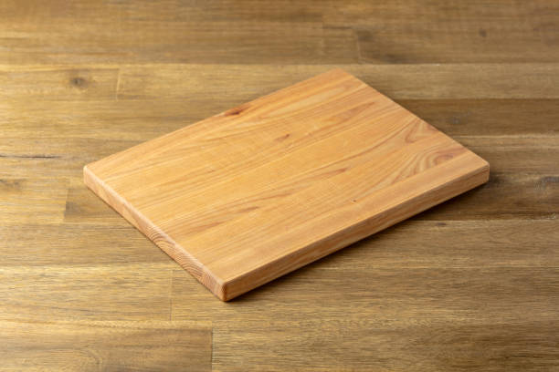 istock Cutting board on a wooden table. 1871082556