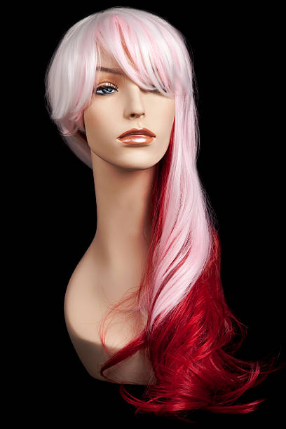 istock Mannequin head with blond and red wig 187108418