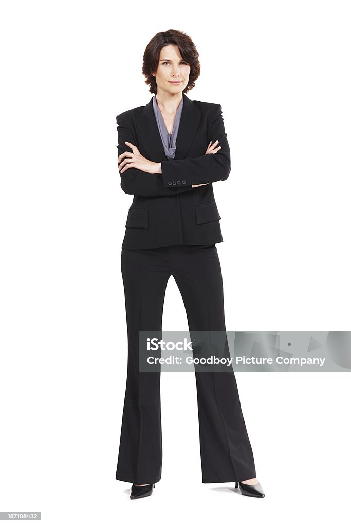 Business is her game Full length studio portrait of a mature businessman Arms Crossed Stock Photo