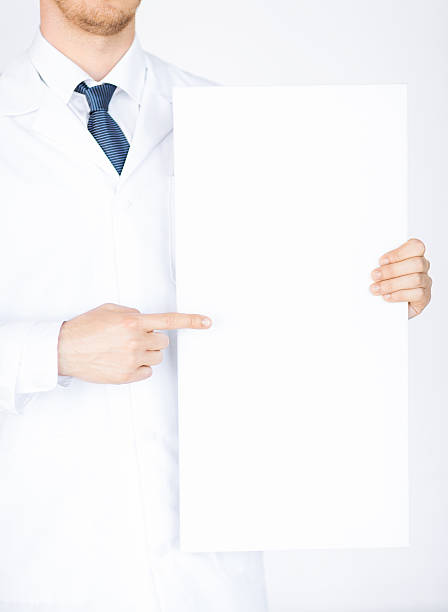 istock doctor holding blank white banner 187109166