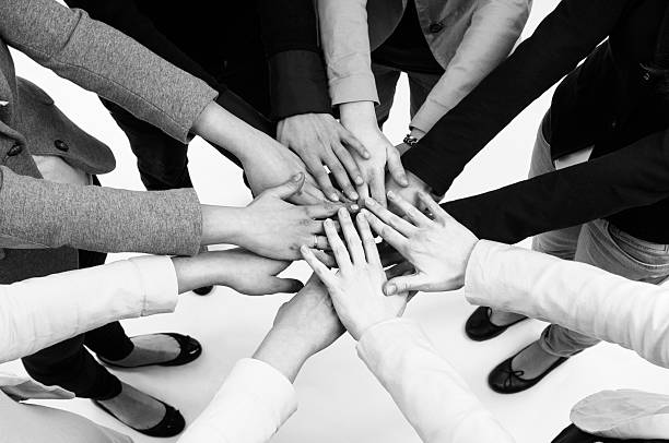 Teamwork Unity Business person Stacking hands.Unity or cooperation concept. stacked hands photos stock pictures, royalty-free photos & images