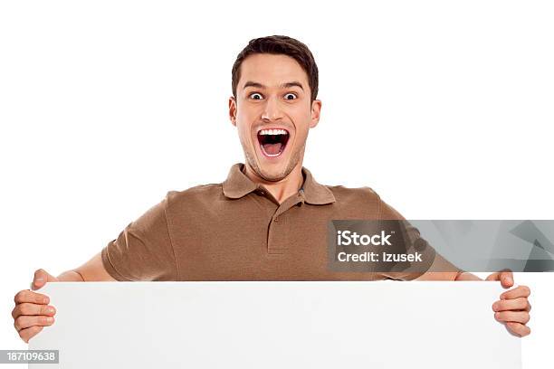 Young Man Holding Whiteboard Stock Photo - Download Image Now - 20-24 Years, Adult, Adults Only
