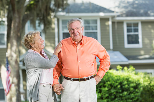 istock Senior couple outside house 187109839