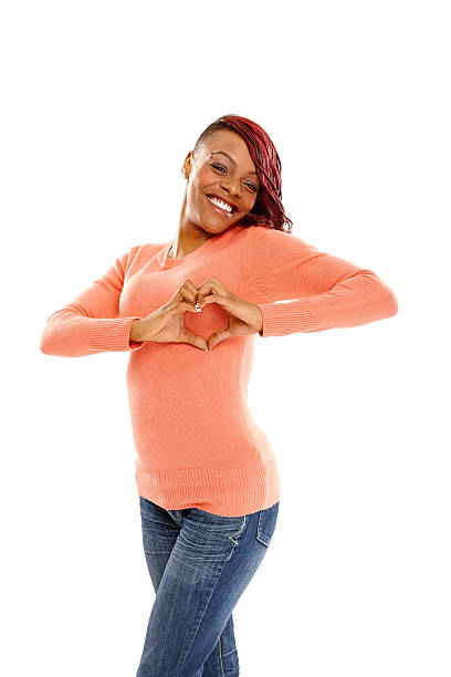 istock Young woman making heart with hands 187110838