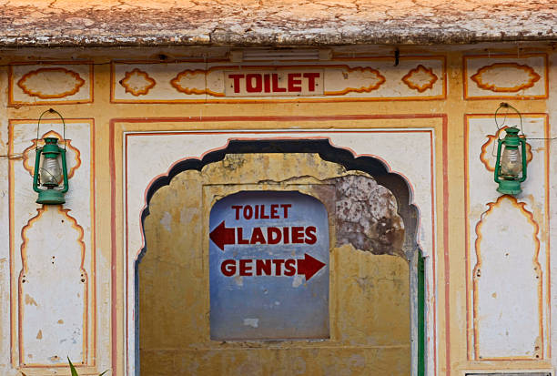 стены из форт в джайпур - old arch architecture painted image стоковые фото и изображения