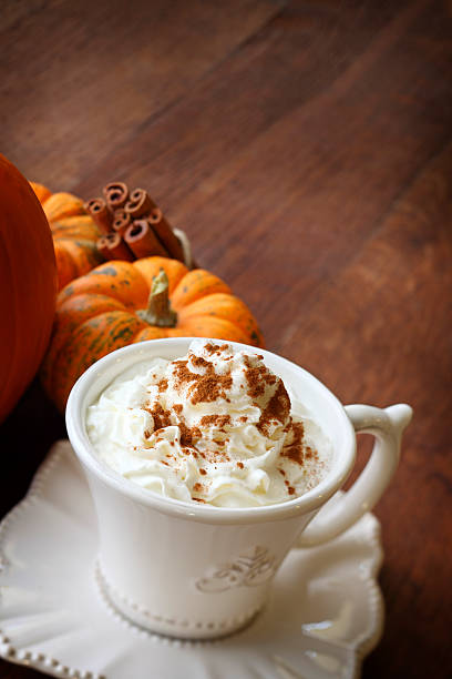 istock Pumpkin Latte And Pumpkins On Wood Surface 187111930