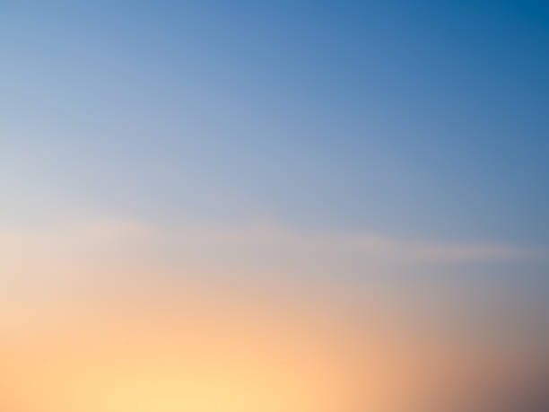 istock Sunset Sky Orange Cloud Sunrise Background Evening Golden Hour Blue Dawn Twilight Summer blur Nature Night Horizon Sun Clear Beautiful Clean Cloudy Light Dramatic Bright Calm Yellow Soft Warm Abstract 1871130810