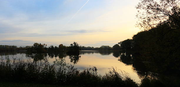 istock Beautiful morning small island in Danish lake mirror effect 187113295