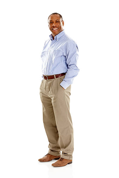 istock Confident mature man standing with his hands in pockets 187113298