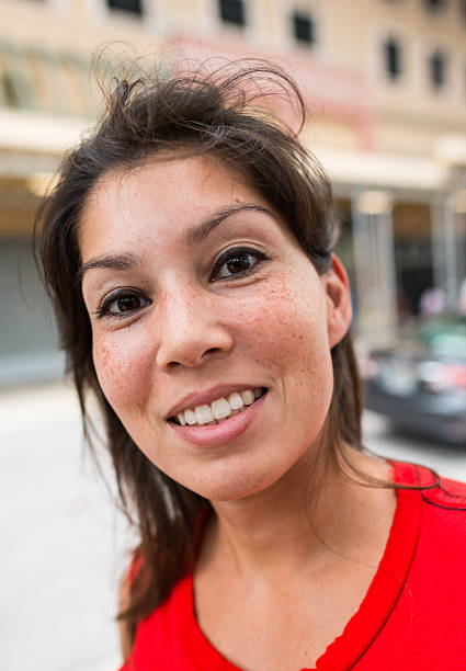 istock Smiling young hispanic woman (real people) 187113320