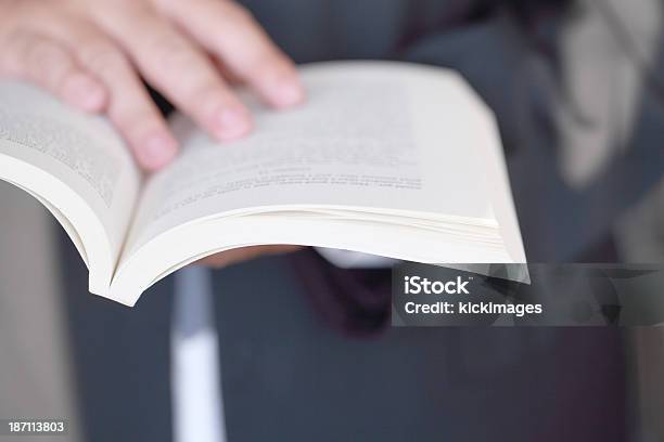 Person Holding Opened Book Stock Photo - Download Image Now - German Paragraph Icon, Law, Book