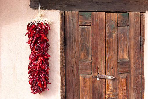 Santa Fe, NM: Chili Pepper Ristra and Rustic Old Brown Door