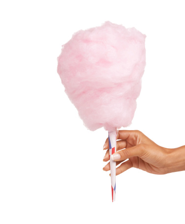Cropped image of a woman holding some delicious candy floss while isolated on whitehttp://195.154.178.81/DATA/i_collage/pi/shoots/785435.jpg