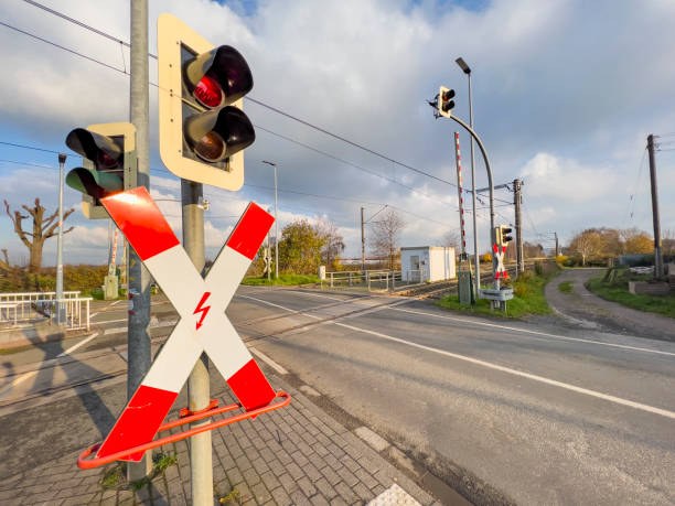 istock St Andrew`s Cross with red traffic light, side view 1871143270