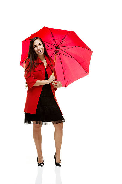 istock Young woman carrying umberalla 187115071