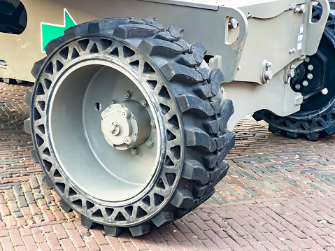 Non bursting car tyre, close up. Economical all-terrain military and agricultural use. New design in the automotive sector.