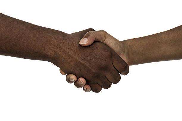 istock African descent man and woman handshake 187115626