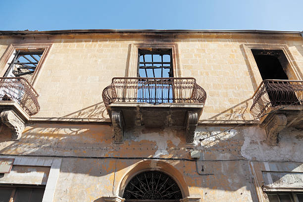 istock facade with three  crumbled burnt out building  balcony  Nicosia  Cyprus 187116205
