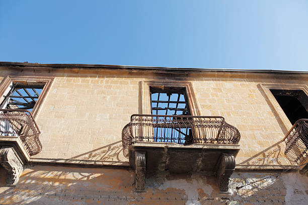 istock three crumbled burnt out building facade balcony  Nicosia  Cyprus 187116213