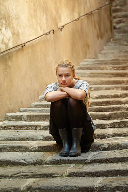 istock Teenage girl on steps 187117127