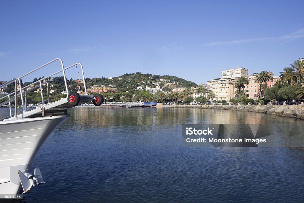 Rapallo on the Riviera di Levante, Italy A ferry or water taxi waiting for passengers just off the promenade in the Italian Riviera town of Rapallo Architecture Stock Photo