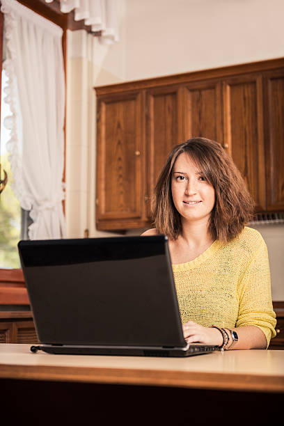 istock Young woman studying at home 187117309