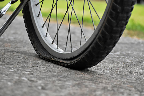 istock Bike flat tire 1871175774